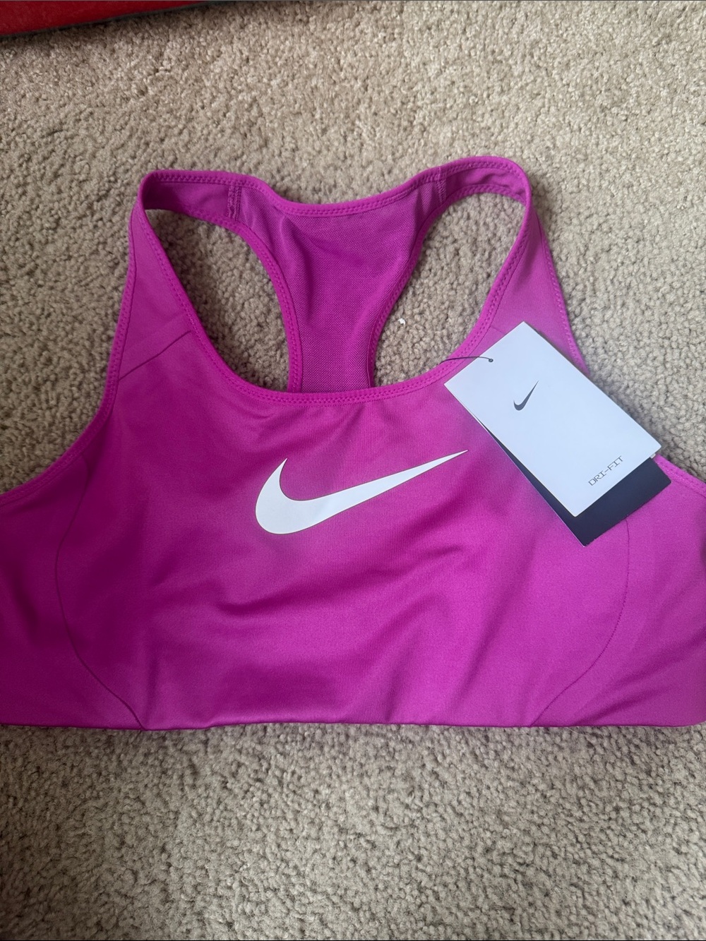 Nike Women's Magenta Racerback Sports Bra with White Swoosh